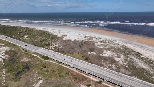 Travel by the Florida coastline on A1A scenic byway passing through St Augustine Beach by coastal homes by beautiful beaches and waterways