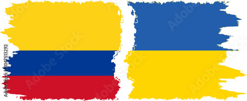 Ukraine and Colombia grunge flags connection, vector