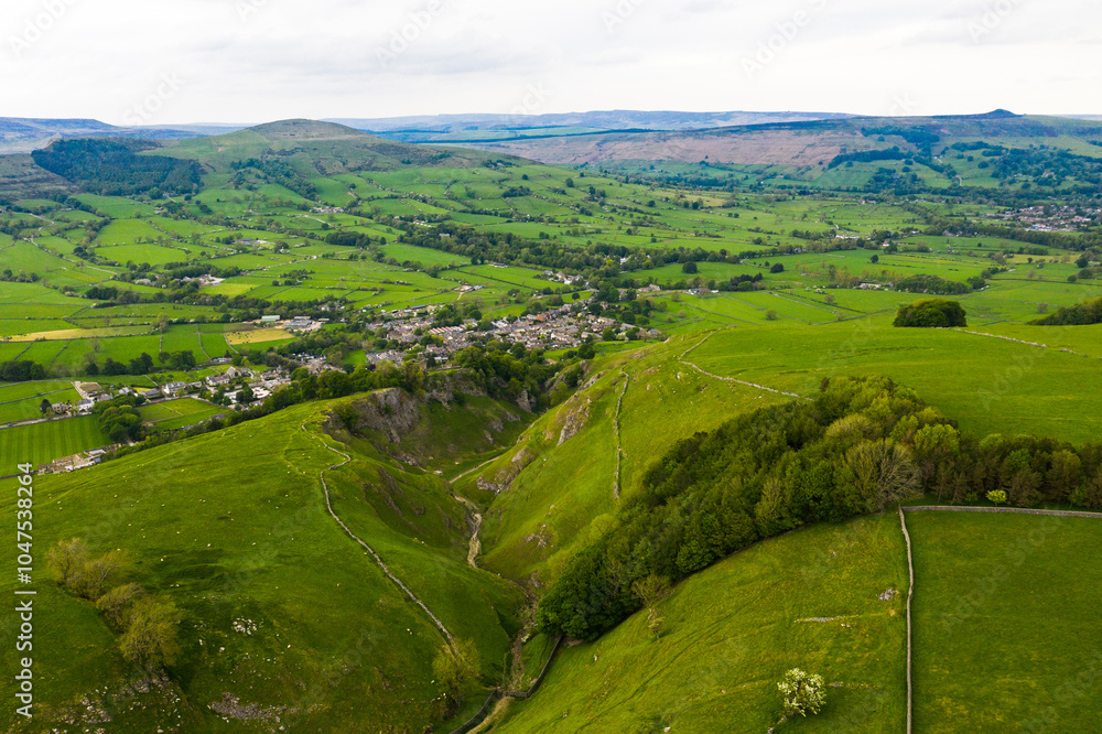 Aerial view wtih beautiful green landscape of Cave Dale limestone deep valley landscape natural tourist trail Steep Rocks Narrow Pass Staffordshire, Derbyshire Peak District Aerial view wtih beautiful green landscape of Cave Dale limestone deep valley landscape natural tourist trail Steep Rocks Narrow Pass Staffordshire, Derbyshire Peak District