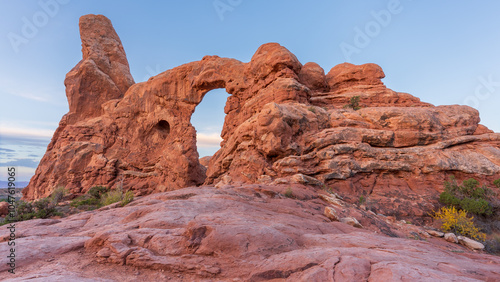 Turret Arch is a large rock formation with a hole in the middle