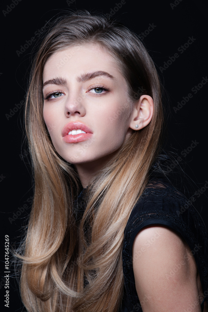 Naklejka premium High fashion photo. Fashionable woman. Fashion beauty portrait. Portrait of a gorgeous young woman. Elegant Lady. Beautiful Model. High fashion portrait of elegant woman. Beauty face. Fashion shooting