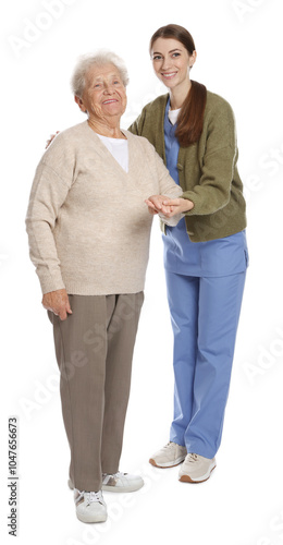 Caregiver supporting senior woman on white background. Home health care service