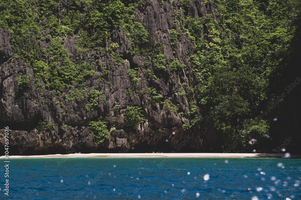 A forgotten Pacific hideaway, from a passing boat's view. Palawan, Philippines. A forgotten Pacific hideaway, from a passing boat's view. Palawan, Philippines.