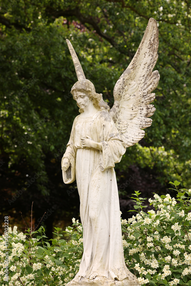 statue in the cemetery close up