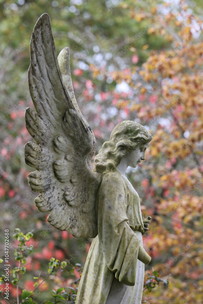 Angel statue on an old grave