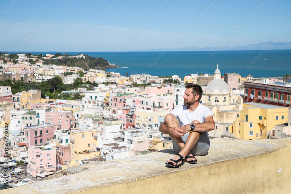 Obraz premium beautiful Procida island with colorful houses in sunny summer day, Italy