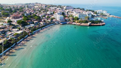 Kusadasi, Aydin, Turkey. Ladies Beach (Turkish: Kadinlar Denizi) in Kusadasi. Touristic beach resort town on Turkey. Aerial view of Kusadasi.