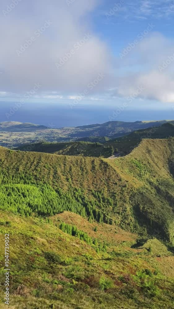 Scenic view of Lagoa do Fogo crater Lake in the Azores A breathtaking view of Lagoa do Fogo, a pristine volcanic crater lake nestled in the lush greenery of the mountains on São Miguel Island Scenic view of Lagoa do Fogo crater Lake in the Azores A breathtaking view of Lagoa do Fogo, a pristine volcanic crater lake nestled in the lush greenery of the mountains on São Miguel Island