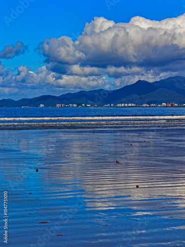 water mirror formed by the tide, reflecting the intense blue of the sky, on Do Indaia beach. photo