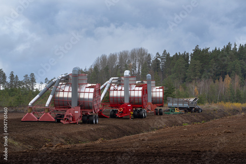 Peat extractors at the production facility photo