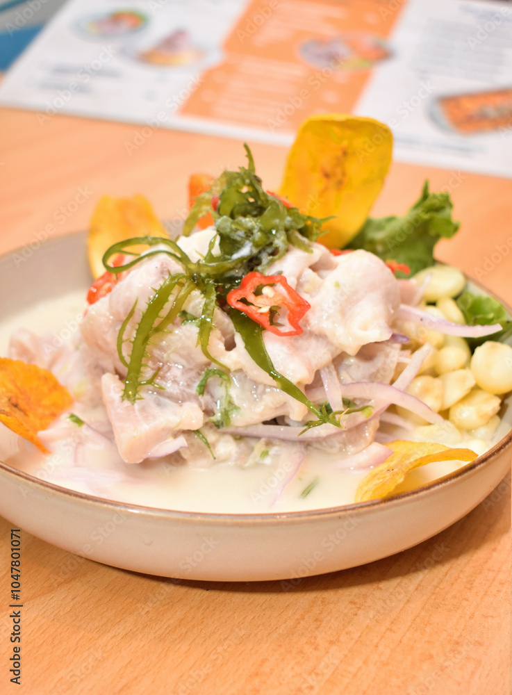 Fish ceviche and rice with seafood, traditional Peruvian dish of fish and seafood Fish ceviche and rice with seafood, traditional Peruvian dish of fish and seafood