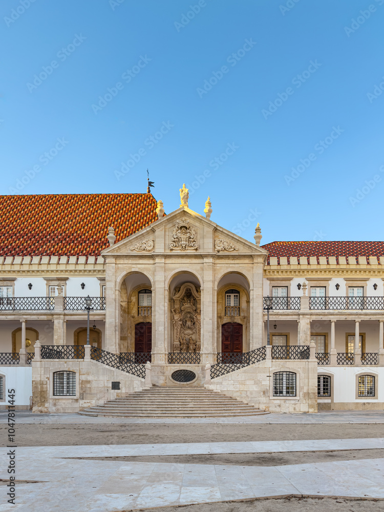 Fototapeta premium Entrance of courtyard and main building of the historic Coimbra University, the oldest university in Portugal and one of the oldest in Europe founded in 1290, Portugal. UNESCO world heritage site
