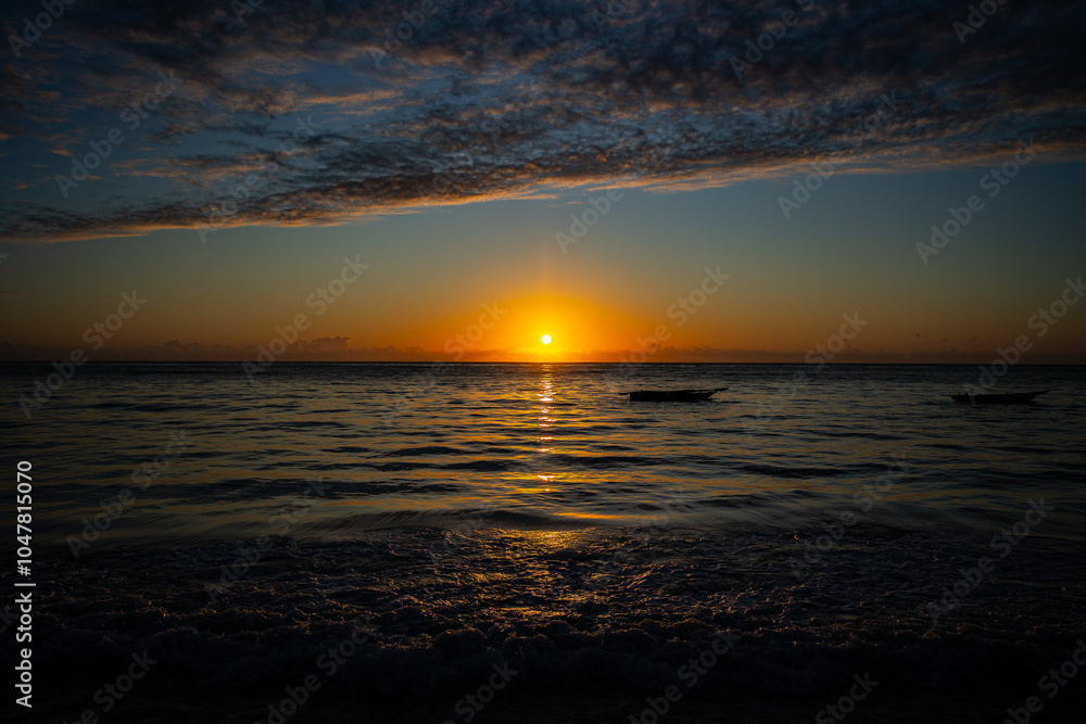 Obraz premium Boot im Sonnenaufgang