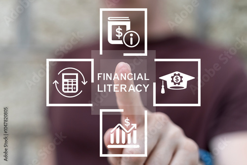 Man using virtual touch screen presses text: FINANCIAL LITERACY. Financial literacy and education with learning concept. Economic knowledge and personal skills. Money planning and control. photo