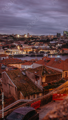 Moody twilight over Porto's Ribeira district with terracotta roofs and Douro riverfront