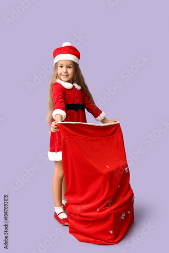 Cute little girl in Santa C...