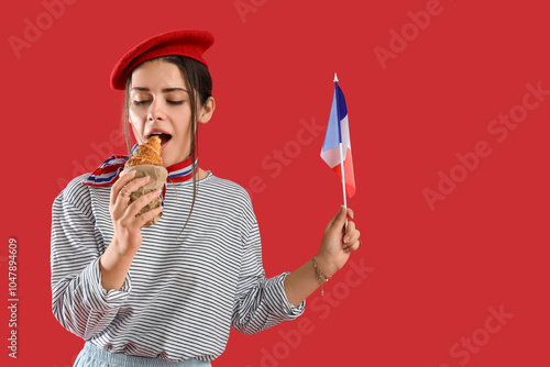 Young woman with flag of Fr...