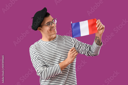 Young man with flag of Fran...