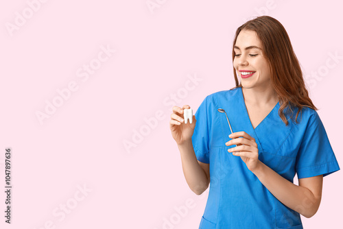 Female dentist with dental ...