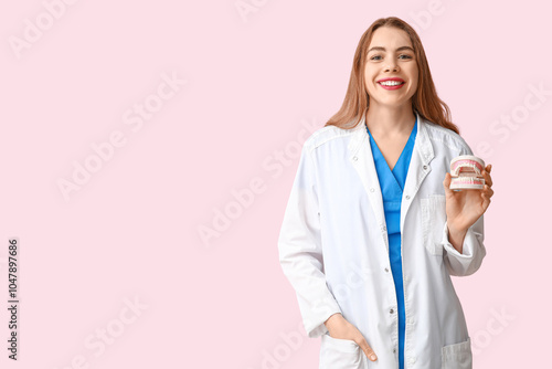 Female dentist with jaw mod...