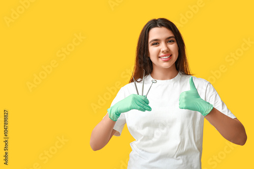 Female dentist with tools s...