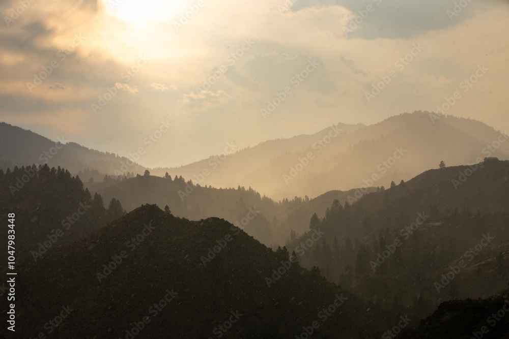 Sunset Over Misty Mountain Range with Soft Light Sunset Over Misty Mountain Range with Soft Light