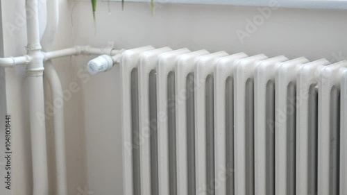 Wallpaper Mural White radiator on grey white wall. apartment heating installation system,  Torontodigital.ca