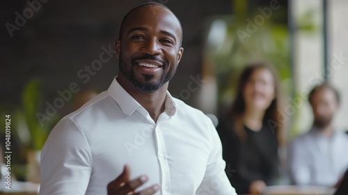 Smiling Businessman Presenting