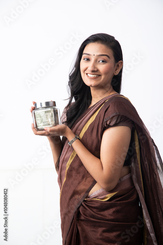 Wife Showing Glass Jar Full Of Notes
