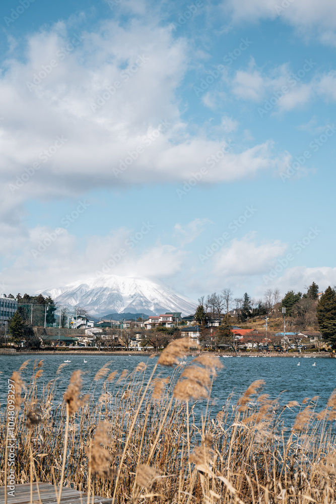 Takamatsu Pond and snowy mountain in Morioka, Iwate, Japan