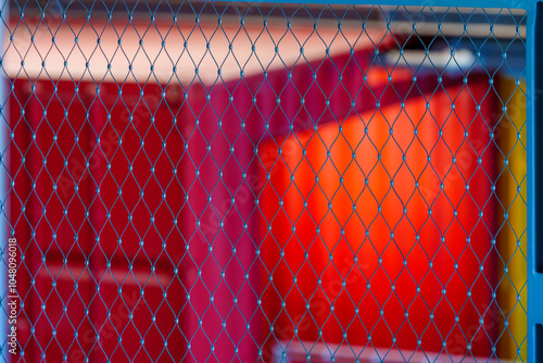 Obraz na płótnie Fence grid, and colorful shipping containers w salonie