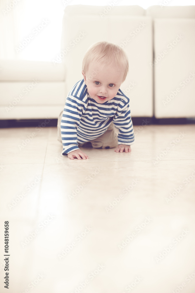 Baby, crawling and child development in house for learning, motor skills and movement as healthy boy. Young, male person and infant as curious for growth, mobility and support in home with happiness Baby, crawling and child development in house for learning, motor skills and movement as healthy boy. Young, male person and infant as curious for growth, mobility and support in home with happiness
