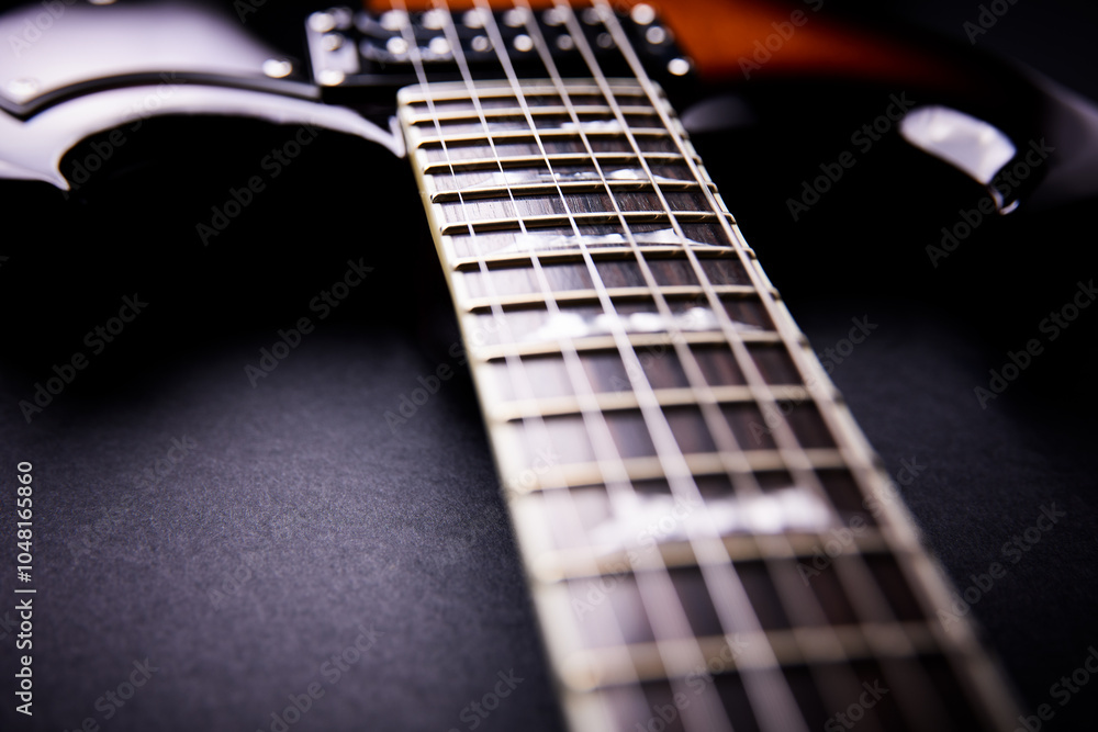 Fototapeta premium Fretboard of modern electric guitar. Close up.