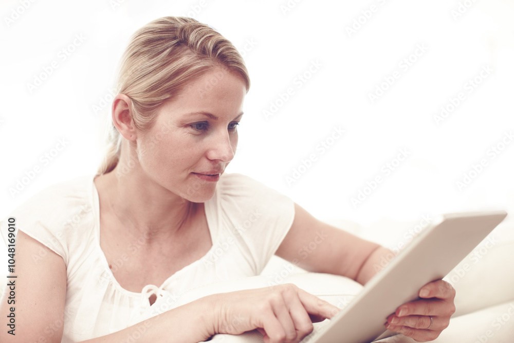 Tablet, home and woman scroll news, reading email and internet search for ebook on sofa. Lounge, relax and person with digital technology for online shopping, download and check social media profile Tablet, home and woman scroll news, reading email and internet search for ebook on sofa. Lounge, relax and person with digital technology for online shopping, download and check social media profile