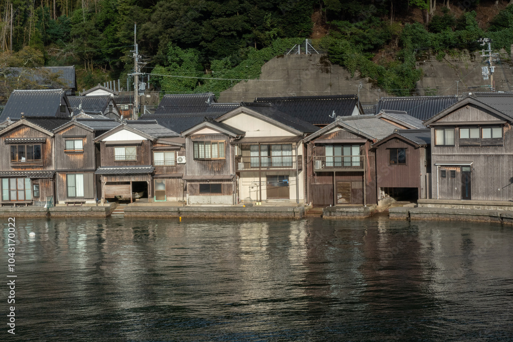 Funaya Boathouses in Ine fisherman village Kyoto Prefecture, The funayas were originally constructed to lift fishermen's wooden boats from the sea