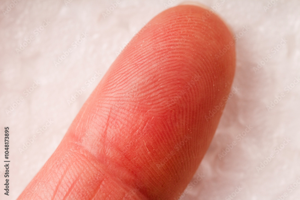 Fototapeta premium Finger Extreme Close-up View . human finger detail, fingerprint