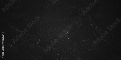 Dark Black distressed grunge texture, old vintage charcoal backdrop granite blackboard and chalkboard. Abstract wall surface, black stucco texture. Black gray satin dark texture luxurious background