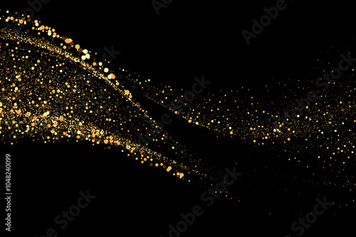Scattered golden particles on a dark background. Festive background or design element.