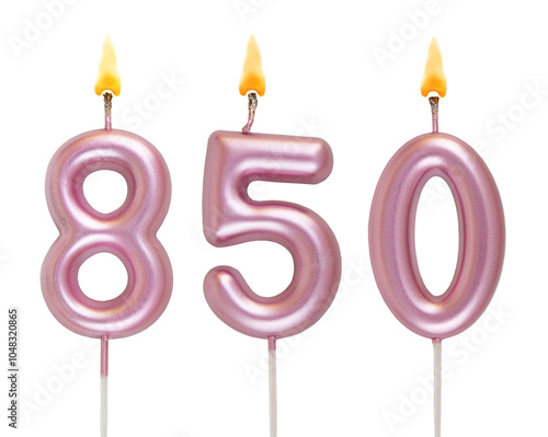 Burning pink birthday candles isolated on white background, number 850