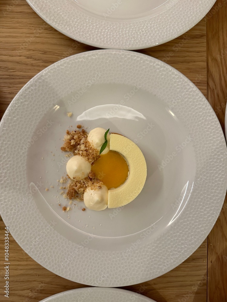Yellow cake nicely decorated on a white plate. Yellow cake nicely decorated on a white plate.