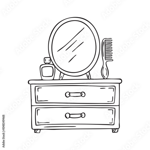 A comb on a vanity with a perfume bottle on the cabinet