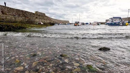 Boat Approaching Dock in Dysart photo