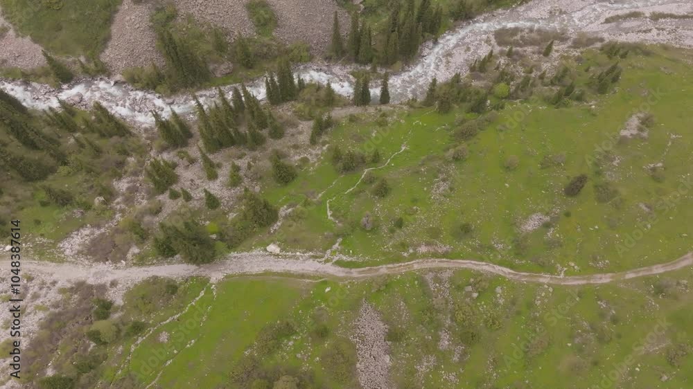 trail near mountain river at the summer, high angle view flying above, drone point of view trail near mountain river at the summer, high angle view flying above, drone point of view
