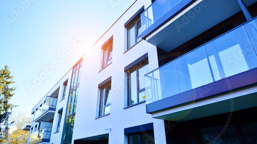 Modern multifamily building in a european city.  Walls made of concrete. Luxury house complex.