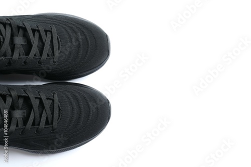 Pair of stylish sneakers on a white background photo