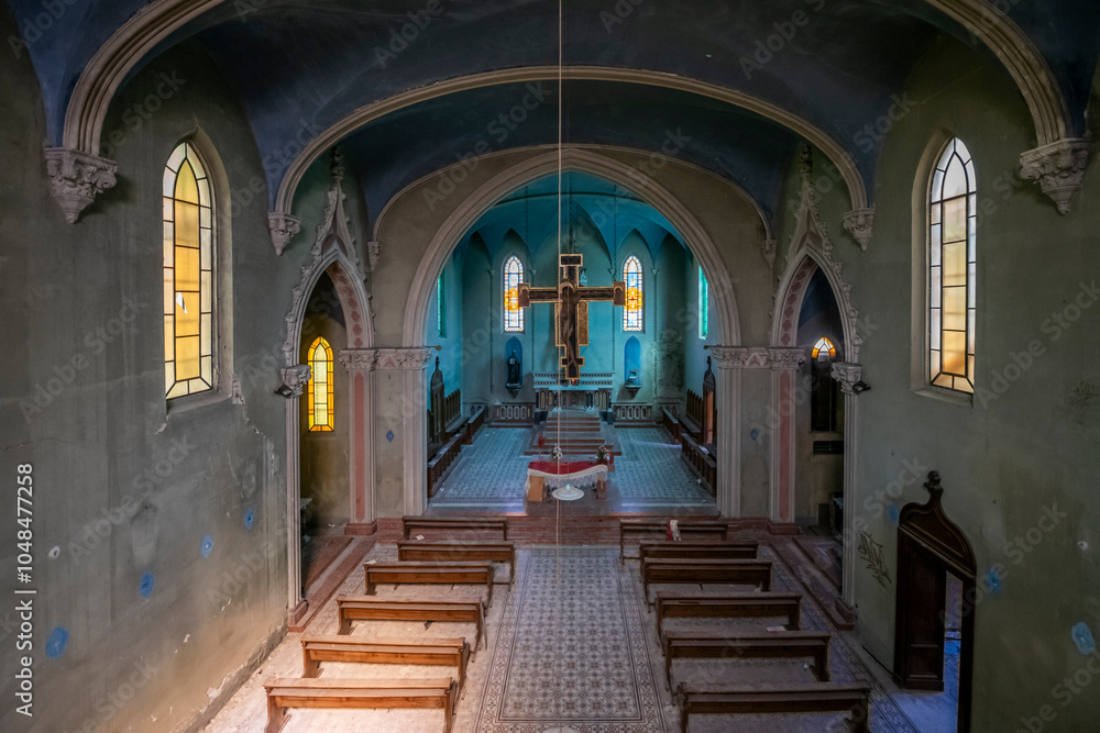 Fototapeta premium Forgotten Building in Northern Italy The Old Abandoned Seminary with a Blue Chapel