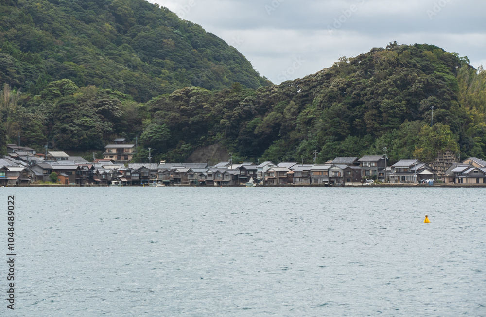 Ine Fishing Village, is famous for its unique funaya, or boat houses. These wooden buildings sit right on the water and serve as both dock and home for the fishermen