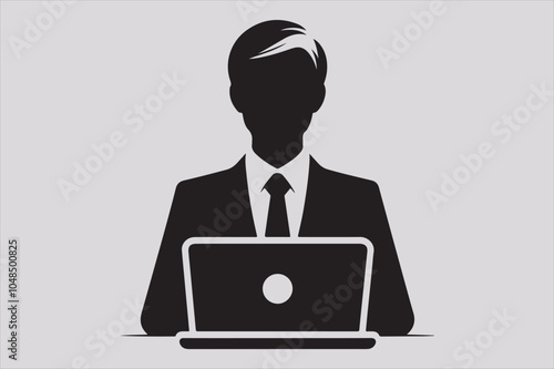 Silhouette of a person sitting behind a laptop.