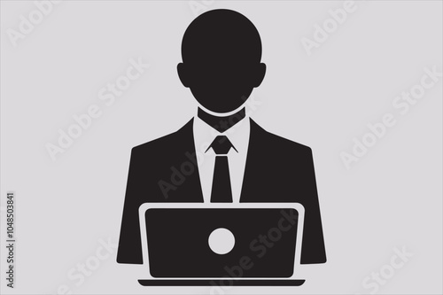 Silhouette of a person sitting behind a laptop.