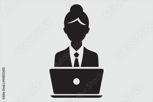 Silhouette of a person sitting behind a laptop.